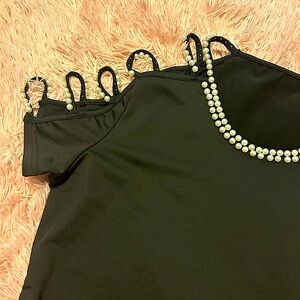 Ladies cold shoulder top with pearl accents